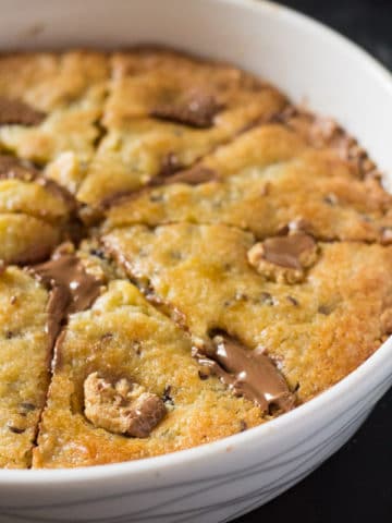 Giant Chocolate Chip Cookie Stuffed with Peanut Butter Cups