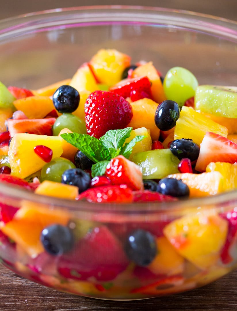 Fruit salad with made with fresh fruit such as pineapple, strawberries and melon.