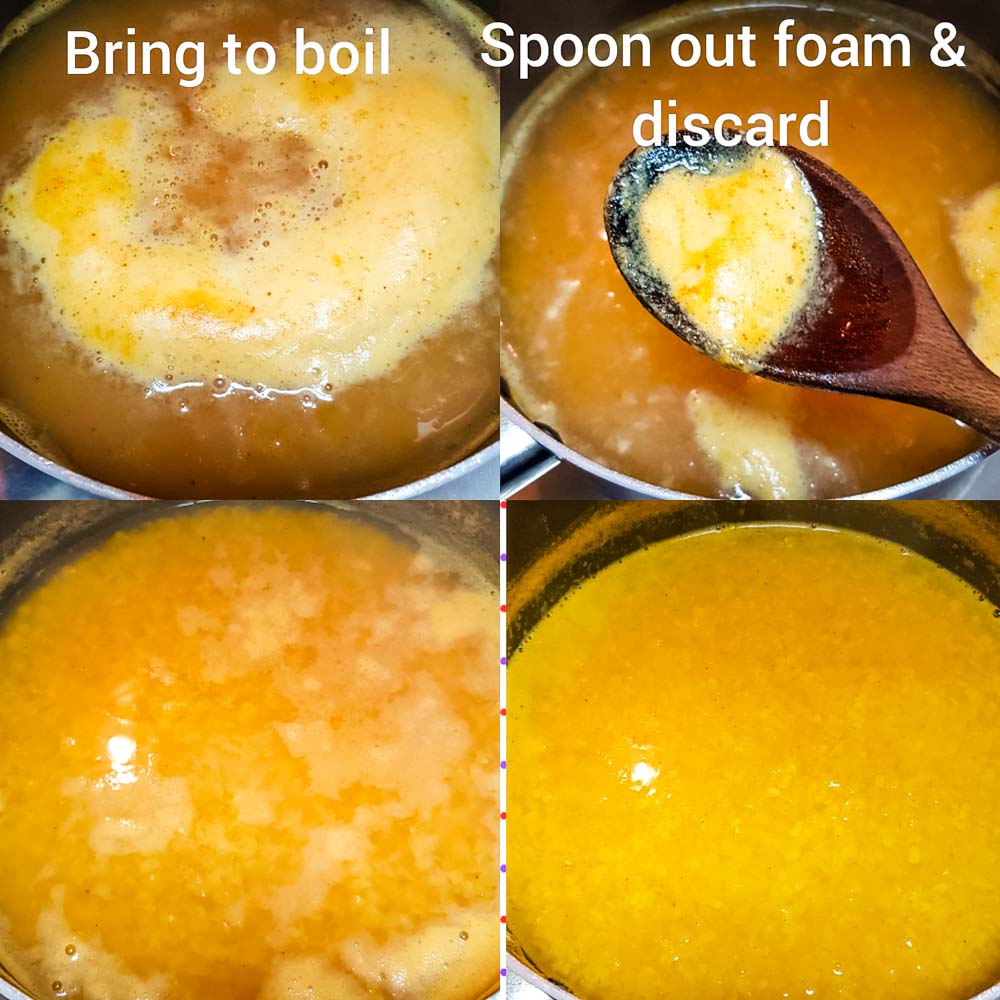 Removing the excess white foam from the daal while it's cooking.