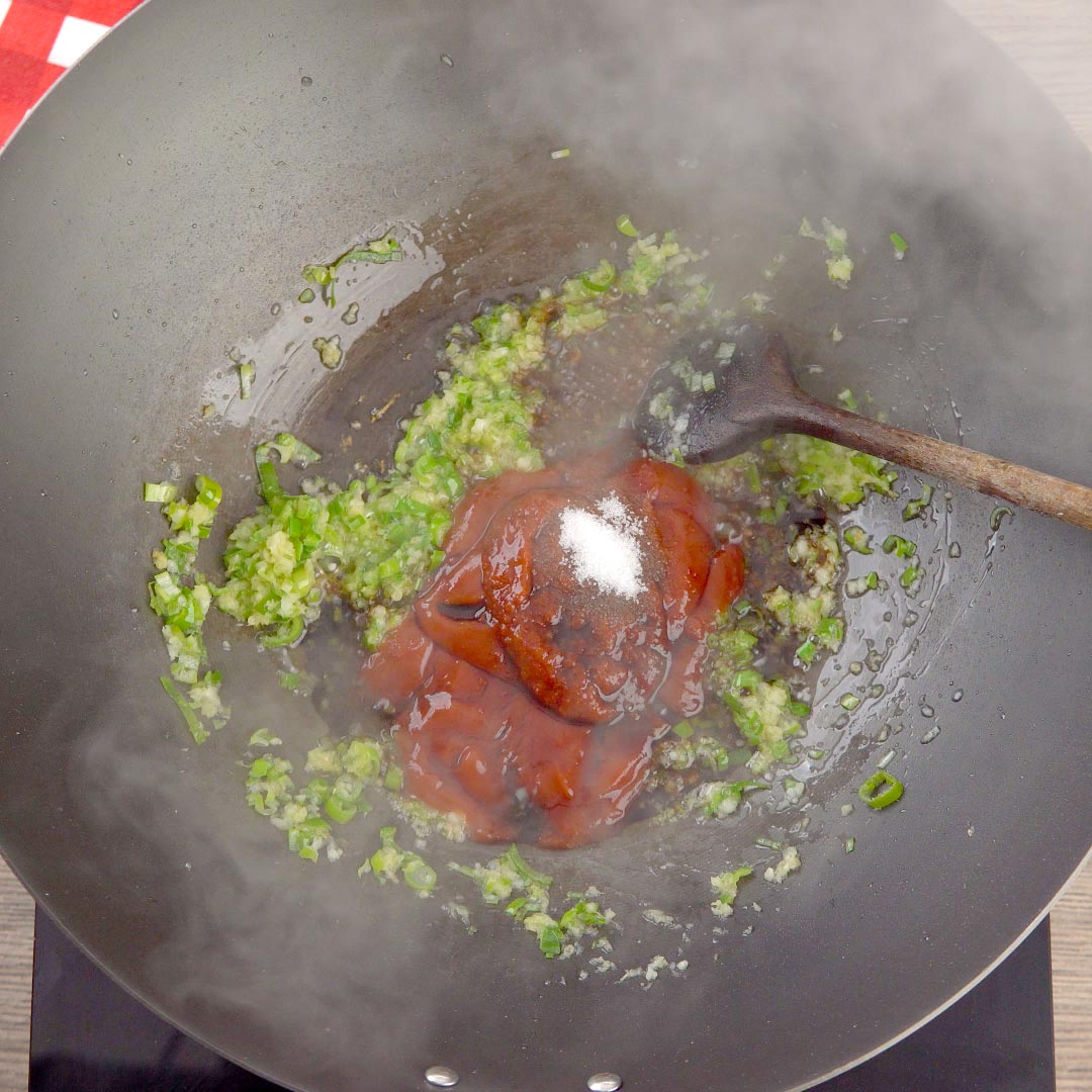 all sauce ingredients, save the water and cornstarch, added to the wok for manchurian sauce
