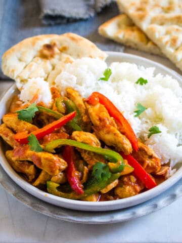 Chicken Jalfrezi served with white rice and naan.