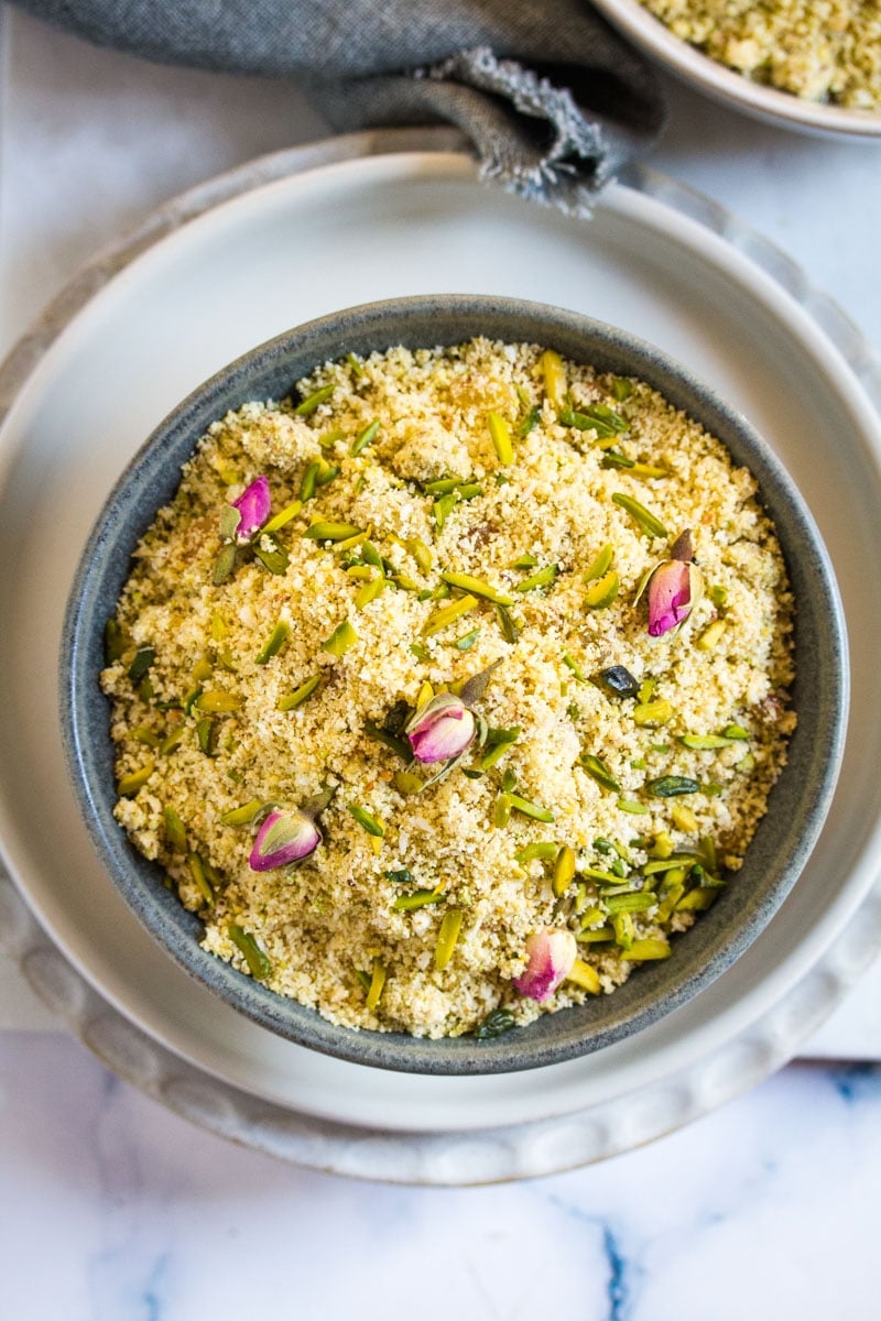 Overhead shot of panjeeri in a grey bowl.