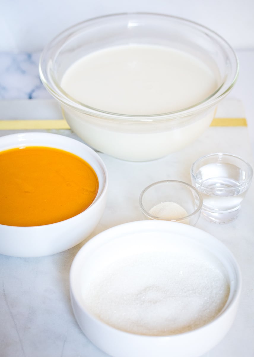 Ingredients for Mango Mousse: heavy cream, mango pulp, gelatine, water, sugar.