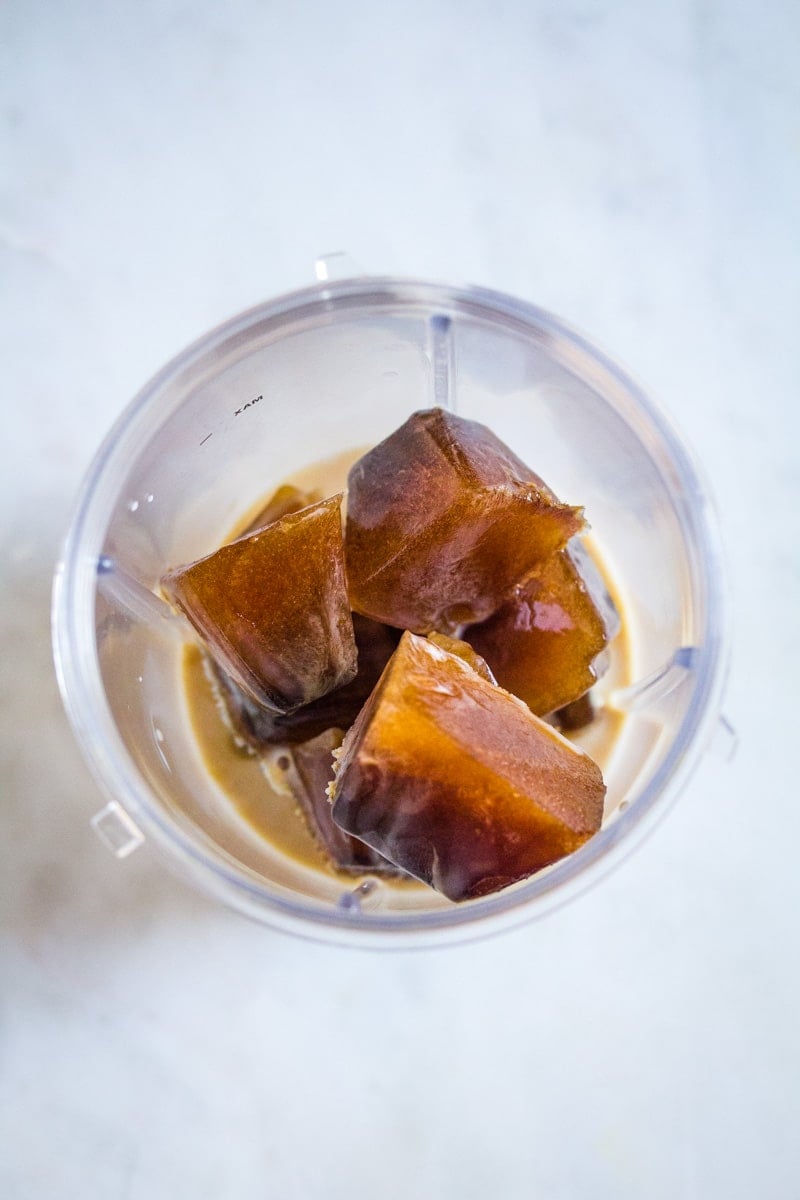 Milk and coffee ice cubes in a blender.