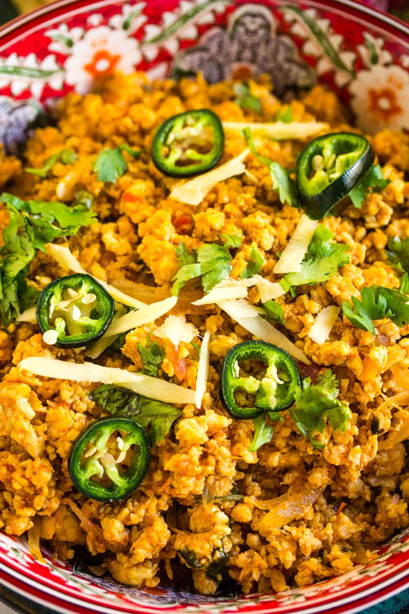 Chicken keema topped with sliced jalapenos, sliced ginger and chopped coriander leaves. 